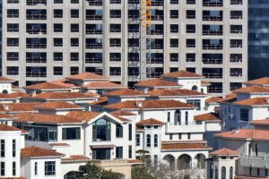 Beijing Signals Strategic Pivot in Real Estate Crisis as Economic Pressures Mount Ahead of National Congress.