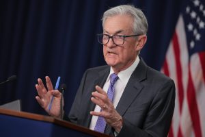 Navigating the Transition: Federal Reserve Lowers Rates Amidst Political Shifts and Economic Data Deficits